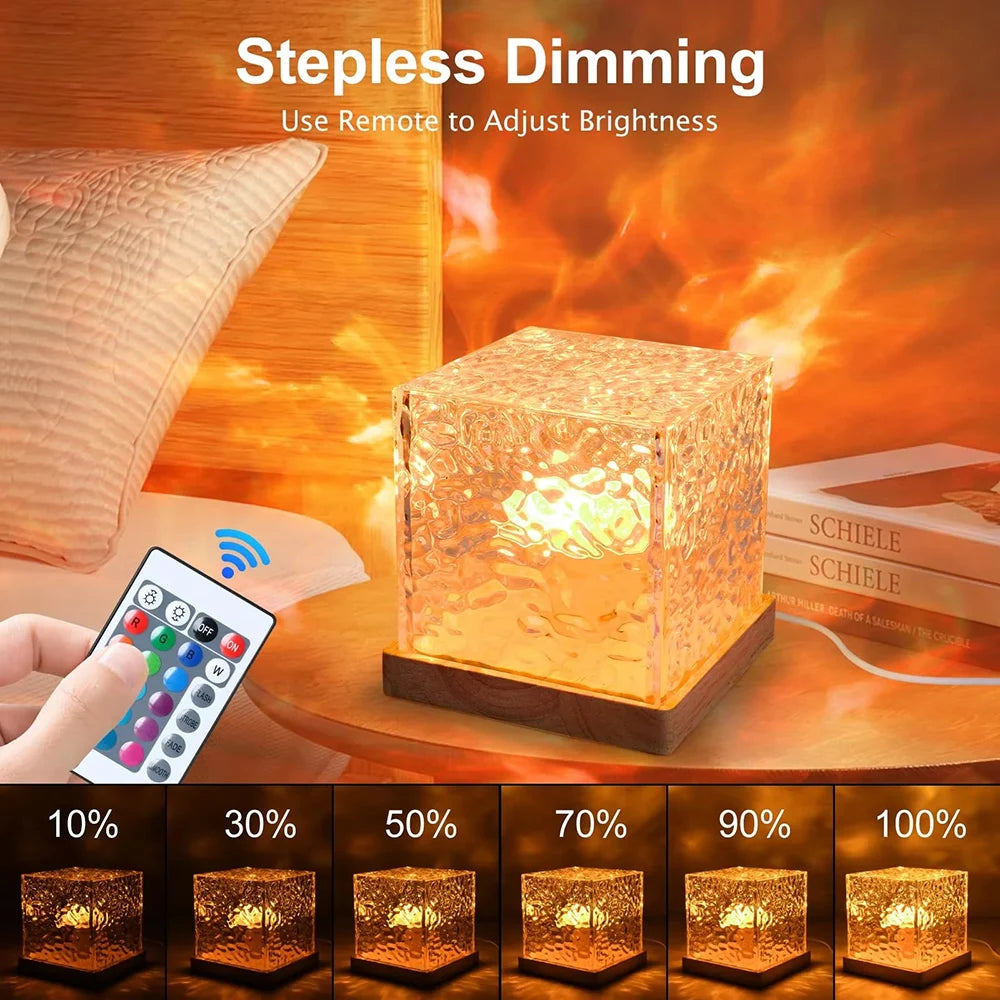 Luminária de mesa giratória com efeito de ondulação na água em 16 cores RGB, ideal para criar atmosfera no quarto com luz e sombra. Também funciona como luz noturna de cabeceira.