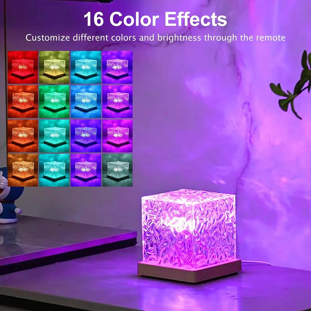 Luminária de mesa giratória com efeito de ondulação na água em 16 cores RGB, ideal para criar atmosfera no quarto com luz e sombra. Também funciona como luz noturna de cabeceira.